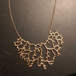 Gold necklace with fun design